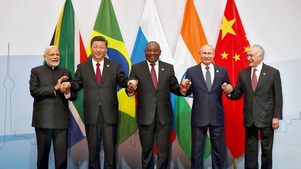 brics alianza líderes banderas moneda